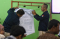 perhitungan-rekapitulasi-surat-suara-pemilu-di-tingkat-kecamatan_20240219_143252.jpg