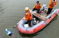 Petugas BPBD Bersihkan Sampah di Danau Masjid Raya Al Jabbar
