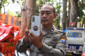 polresta-malang-kota-launching-etle-mobile-handheld_20240724_184147.jpg