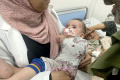 potret-penyelamatan-anak-anak-palestina-dari-serangan-israel_20231023_143113.jpg
