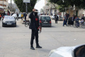 potret-pria-bertopeng-menjaga-ketertiban-rafah_20240307_070456.jpg