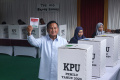 prabowo-subianto-gunakan-hak-pilih-di-pemilu-2024_20240214_104558.jpg
