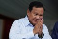 prabowo-subianto-gunakan-hak-pilih-di-pemilu-2024_20240214_104759.jpg
