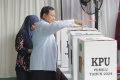 prabowo-subianto-gunakan-hak-pilih-pada-pemilu-2024_20240214_113350.jpg