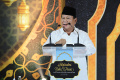 prabowo-subianto-hadiri-buka-puasa-bersama-tkn_20240326_064601.jpg