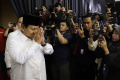 prabowo-subianto-hadiri-buka-puasa-bersama-tkn_20240326_065305.jpg