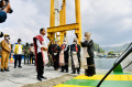 presiden-jokowi-disambut-prosesi-adat-batak-di-kabupaten-toba_20220204_225207.jpg