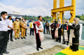 presiden-jokowi-disambut-prosesi-adat-batak-di-kabupaten-toba_20220204_225422.jpg