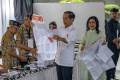 presiden-jokowi-gunakan-hak-pilih-di-pemilu-2024_20240214_153049.jpg