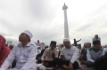 Ribuan Umat Muslim Mulai Memenuhi Lapangan Monas