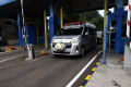 ridwan-kamil-dan-jenazah-eril-tiba-di-bandara-soetta_20220612_193209.jpg