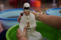 Ritual Memandikan Patung Dewa di Wihara Amurva Bhumi