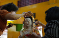 Ritual Memandikan Patung Dewa di Wihara Amurva Bhumi