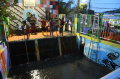 rumah-pompa-prapen-percepat-saluran-air_20240117_233112.jpg