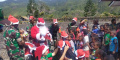 Santa Claus Kodim 1714/Puncak Jaya Berbagi Kado Natal