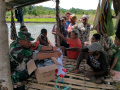satgas-pamtas-yonif-126kc-bantu-warga-tanam-padi-di-perbatasan_20220406_142309.jpg