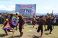 satgas-pamtas-yonif-raider-142kj-gelar-lomba-tari-adat-papua_20221007_120347.jpg