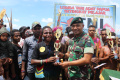 Satgas Pamtas Yonif Raider 142/KJ Gelar Lomba Tari Adat Papua