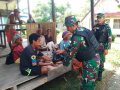 satgas-yonif-126kc-baksos-di-perbatasan-ri-png_20220511_124703.jpg