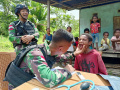 satgas-yonif-126kc-berikan-pelayanan-kesehatan-gratis_20220928_112347.jpg