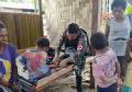 Satgas Yonif 126/KC Keliling Kampung Berikan Pelayanan Kesehatan