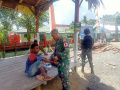 Satgas Yonif 126/KC Obati Warga di Perbatasan