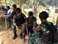 Satgas Yonif Mekanis 203/AK Kegiatan Sosial Bersama Tokoh Masyarakat