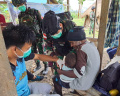Satgas Yonif Raider 142/KJ dan Puskesmas Kelila Gelar Imunisasi