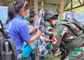 Satgas Yonif Raider 142/KJ dan Puskesmas Kelila Gelar Imunisasi