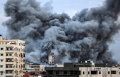 serangan-balik-israel-bumi-hanguskan-kota-gaza_20231008_145353.jpg