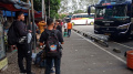 siasati-kenaikan-harga-tiket-bus-warga-mudik-lebih-awal_20220417_142149.jpg