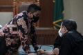 Sidang Putusan Robin Pattuju dan Maskur Husain