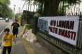 spanduk-lawan-dinasti-politik-bertebaran-di-jakarta_20231015_185514.jpg