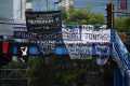 Spanduk Usut Tuntas Tragedi Stadion Kanjuruhan Bertebaran di Malang