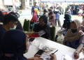 suasana-antusias-warga-saat-vaksin-booster-di-tangerang_20220418_165324.jpg