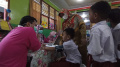 suntik-vaksinasi-covid-19-siswa-baru-sdn-periuk-1-tangerang_20220726_121857.jpg