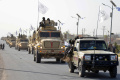 taliban-pamerkan-alutsista-peninggalan-as_20240816_073755.jpg