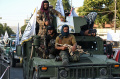 taliban-pamerkan-alutsista-peninggalan-as_20240816_080635.jpg