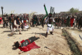teatrikal-tragedi-karbala-peringati-10-muharam-di-irak_20220810_210032.jpg