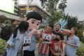 tkn-pemilih-muda-prabowo-gibran-bagi-bagi-susu-gratis_20231231_140646.jpg