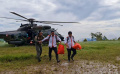 TNI AU Evakuasi Warga Korban Banjir dan Tanah Longsor Latimojong