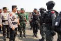tni-polri-gelar-pasukan-pengamanan-pemilu-2024-di-monas_20231017_161052.jpg