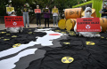 tolak-pembuangan-air-radioaktif-fukushima-ke-laut_20220608_142727.jpg