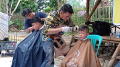 Tukang Pangkas Rambut DKapster Layani Cukur Gratis Anak Panti