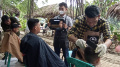 tukang-pangkas-rambut-dkapster-layani-cukur-gratis-anak-panti_20220624_185314.jpg