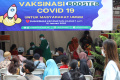 vaksinasi-booster-covid-19-di-puskesmas-kecamatan-kramat-jati_20220112_140605.jpg