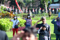 warga-malang-dan-turis-asing-ikuti-upacara-kemerdekaan-ri_20220817_144536.jpg