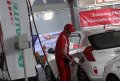 Warga Mengisi BBM Jenis Premium