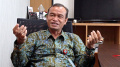 warman-syanudin-kepala-dinas-koperasi-dan-ukm-kota-tangsel_20220902_005138.jpg