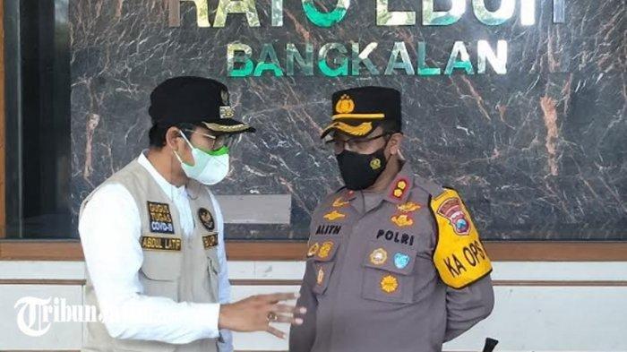 Kapolres Bangkalan, AKBP Alith Alarino bersama Bupati Bangkalan, R Abdul Latif Amin Imron dalam kesempatan pemantauan pelaksanaan Serbuan Vaksinasi Gratis di pelataran Gedung Rato Ebu, Selasa (13/7/2021).